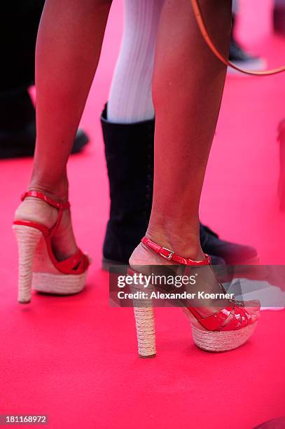 The shoes of German TV presenter Verona Pooth are seen during the red carpet prior the Ferrero kinderTag 2013 event at Heidepark on September 19,...
