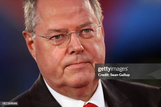 German Social Democrats chancellor candidate Peer Steinbrueck speaks to visitors at an SPD election rally on September 16, 2013 in Berlin, Germany....