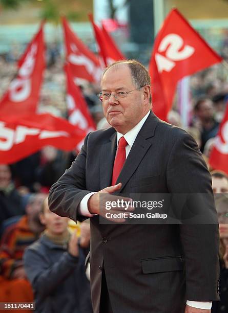 German Social Democrats chancellor candidate Peer Steinbrueck arrives to speak to supporters at an SPD election rally on September 16, 2013 in...