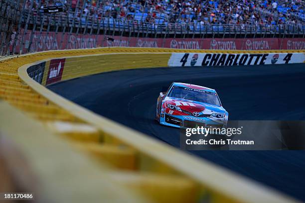 Kyle Busch, driver of the M&M's Red-White-Blue M-Prove America Toyota, during the NASCAR Sprint Cup Series Coca-Cola 600 at Charlotte Motor Speedway...