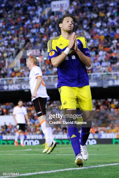 Michu of Swansea City celebrates after scoring his team's second goal the UEFA Europa League Group A match between Valencia CF and Swansea City at...