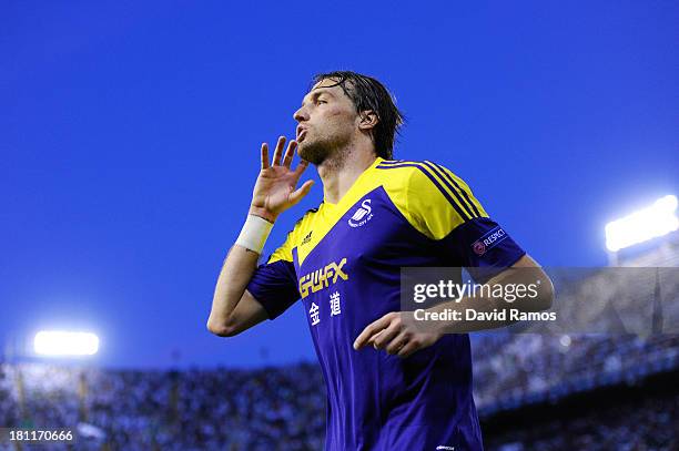 Michu of Swansea City celebrates after scoring his team's second goal during the UEFA Europa League Group A match between Valencia CF and Swansea...