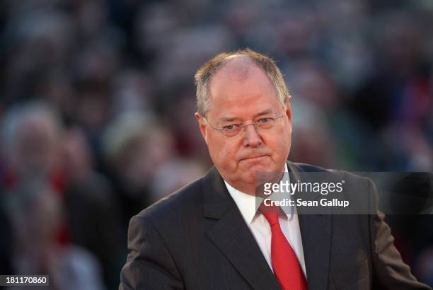 German Social Democrats chancellor candidate Peer Steinbrueck speaks to visitors at an SPD election rally on September 16, 2013 in Berlin, Germany....