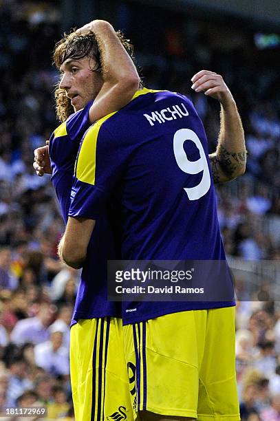Michu of Swansea City celebrates after scoring his team's second goal during the UEFA Europa League Group A match between Valencia CF and Swansea...