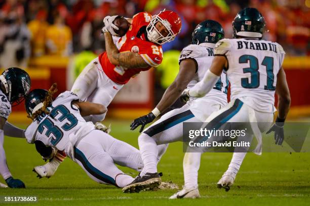 Bradley Roby of the Philadelphia Eagles tackles Skyy Moore of the Kansas City Chiefs during the fourth quarter at GEHA Field at Arrowhead Stadium on...