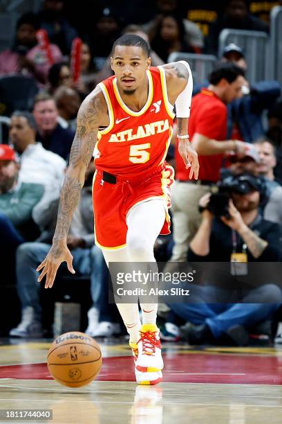 Dejounte Murray of the Atlanta Hawks drives against the Brooklyn Nets during the first half at State Farm Arena on November 22, 2023 in Atlanta,...