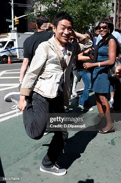 America's Got Talent" Season 8 winner Kenichi Ebina visits "Extra" in Times Square on September 19, 2013 in New York City.