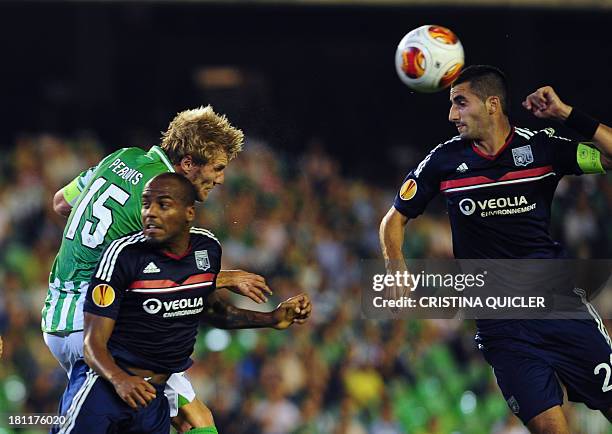 Lyon's French midfielder Maxime Gonalons heads the ball during the UEFA Europa League football match Real Betis vs Olympique Lyonnais at the Benito...