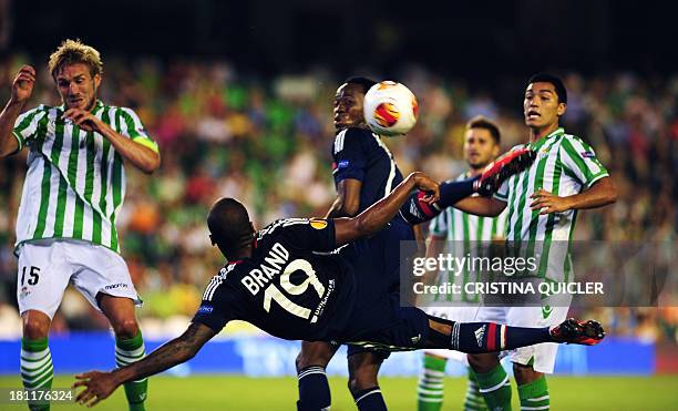 Lyon's French forward Jimmy Briand kicks the ball during the UEFA Europa League football match Real Betis vs Olympique Lyonnais at the Benito...