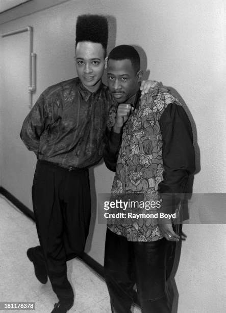 Rapper and actor Christopher "Kid" Reid of Kid 'n Play and comedian and actor Martin Lawrence, poses for photos backstage at the Vic Theater in...