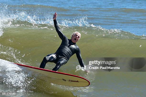 Large waves hit Marconi Beach, drawing surfers from around the region even as seals swim around them and despite previous shark sightings, on...