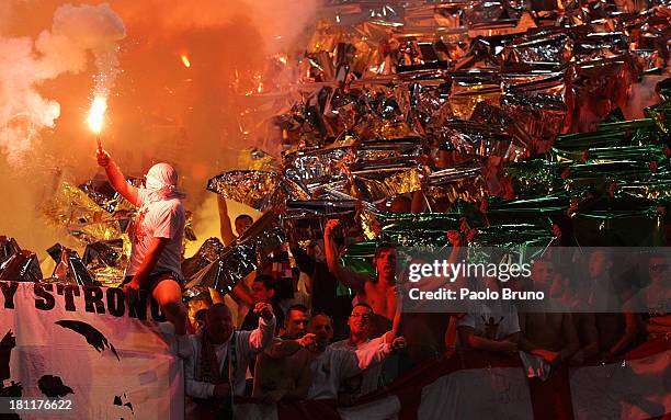 Legia Warszawa fans support their team during the Uefa Europa League Group J match between SS Lazio and Legia Warszawa at Stadio Olimpico on...