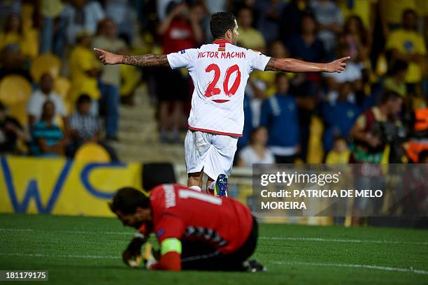 Sevilla's midfielder Victor Machin celebrates after scoring during the UEFA Europa League, group H, football match Estoril vs Sevilla at the Antonio...