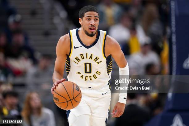 Tyrese Haliburton of the Indiana Pacers dribbles the ball in the second quarter against the Toronto Raptors at Gainbridge Fieldhouse on November 22,...