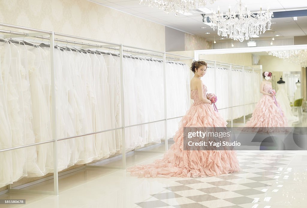 Bride holding a bouquet ,smiling