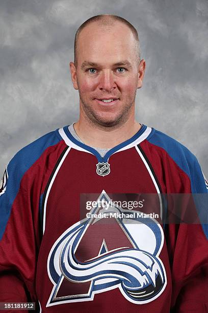 Alex Tanguay of the Colorado Avalanche poses for his official headshot for the 2013-2014 NHL season on September 11, 2013 at the Pepsi Center in...