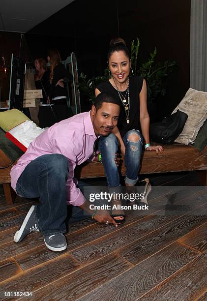 Actor Brian White and Paula Da Silva attend Kari Feinstein's Pre-Emmy Style Lounge at the Andaz Hotel on September 19, 2013 in Los Angeles,...