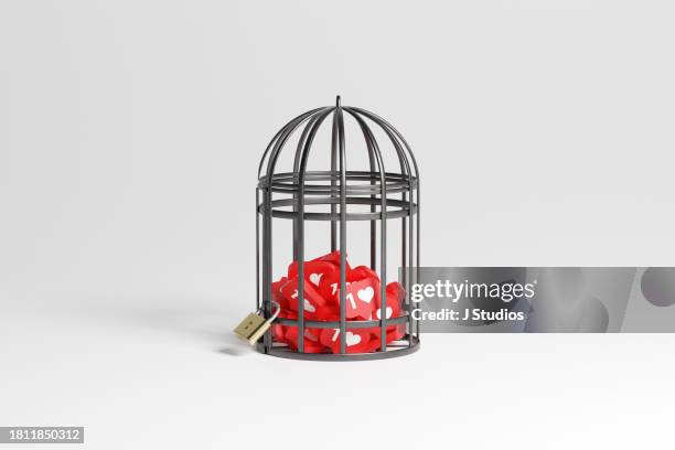 social media icons locked in cage - loneliness icon stock pictures, royalty-free photos & images