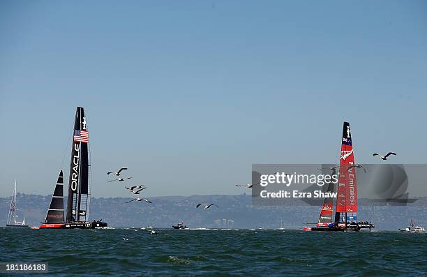 Emirates Team New Zealand skippered by Dean Barker in action against Oracle Team USA skippered by James Spithill during race 12 of the America's Cup...