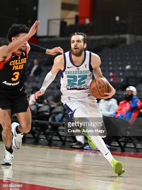 Hunter of the Greensboro Swarm drives to the basket during the game against the College Park Skyhawks on November 29, 2023 at Gateway Center Arena in...