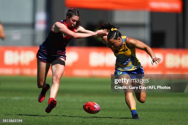 Alyssa Bannan of the Demons and Jessica Sedunary of the Eagles compete for the ball during the 2023 AFLW Round 07 match between the West Coast Eagles...