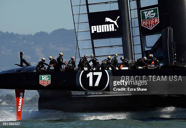 Oracle Team USA skippered by James Spithill in action against Emirates Team New Zealand during race 12 of the America's Cup Finals on September 19,...
