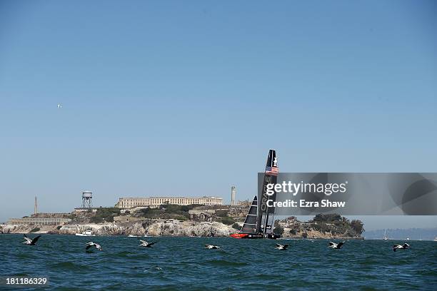 Oracle Team USA skippered by James Spithill in action against Emirates Team New Zealand during race 12 of the America's Cup Finals on September 19,...