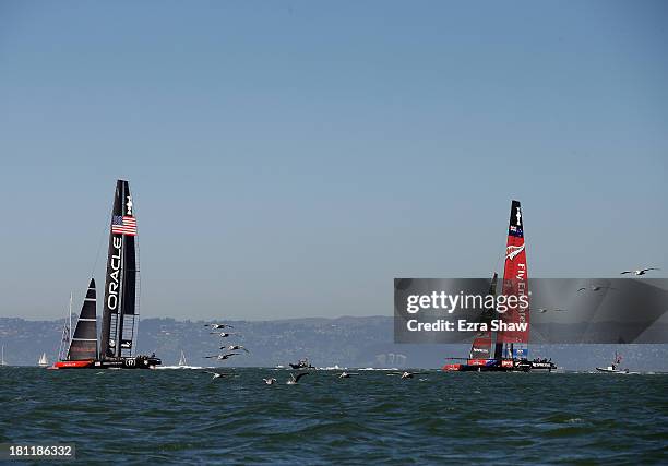 Emirates Team New Zealand skippered by Dean Barker in action against Oracle Team USA skippered by James Spithill during race 12 of the America's Cup...