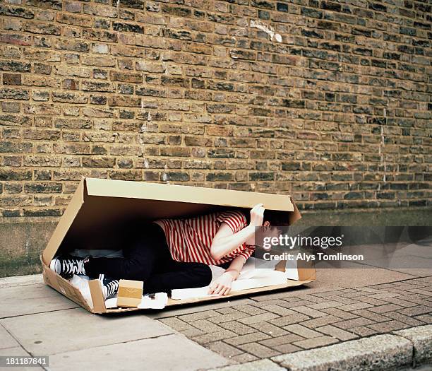 Hiding In Box Person Hiding In Box Photos and Premium High Res Pictures - Getty Images