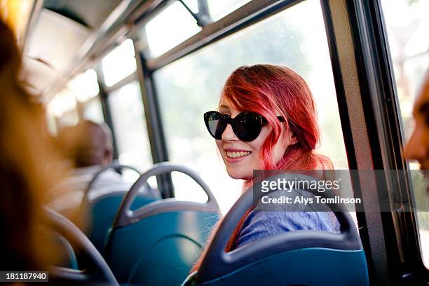 girls together on a bus on a sunny day - dyed shades imagens e fotografias de stock