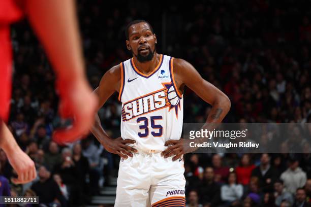 Kevin Durant of the Phoenix Suns looks on during the game against the Toronto Raptors on November 29, 2023 at the Scotiabank Arena in Toronto,...