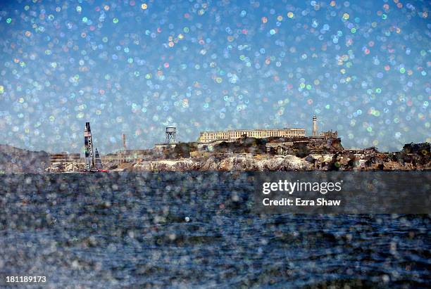 Emirates Team New Zealand skippered by Dean Barker in action against Oracle Team USA skippered by James Spithill during race 12 of the America's Cup...