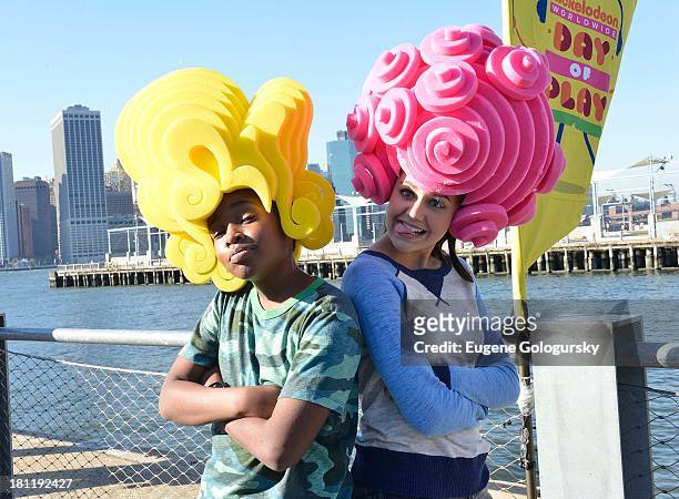 Curtis Harris Jr. And Amber Montana attend the Nickelodeon And Brooklyn Bridge Park Host Mini-Triathlon on September 19, 2013 in New York City.
