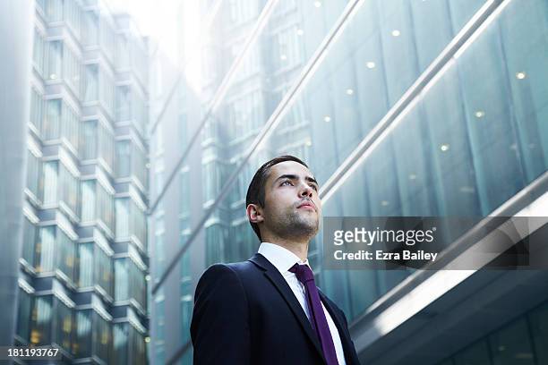 portrait of a businessman in the city. - progress pride stock pictures, royalty-free photos & images