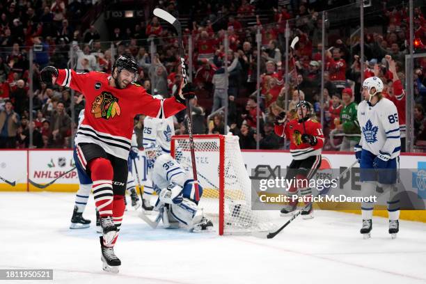 Jason Dickinson of the Chicago Blackhawks celebrates after scoring his second goal of the game against the Toronto Maple Leafs during the second...