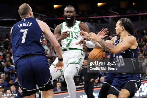 Joe Ingles of the Orlando Magic fouls Jaylen Brown of the Boston Celtics during the first quarter of an NBA In-Season Tournament game at Amway Center...