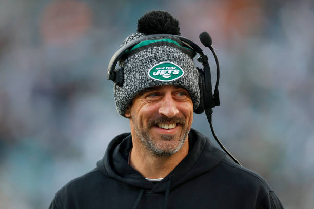 Aaron Rodgers of the New York Jets looks on from the sideline prior to the game against the Miami Dolphins at MetLife Stadium on November 24, 2023 in...