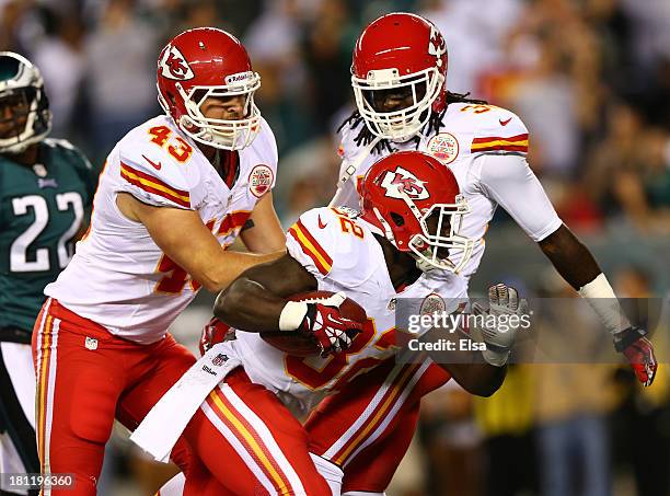 Cyrus Gray of the Kansas City Chiefs celebrates with teammates after recovering a fumble against the Philadelphia Eagles in the first quarter at...