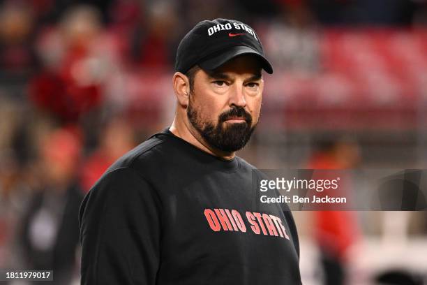 Head coach Ryan Day of the Ohio State Buckeyes watches pregame warmups prior to a game against the Michigan State Spartans at Ohio Stadium on...