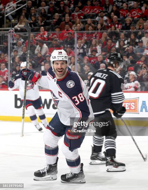 Boone Jenner of the Columbus Blue Jackets celebrates his goal during the first period against the New Jersey Devils at Prudential Center on November...