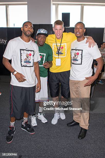 Brooklyn Nets players Alan Anderson, Tyshawn Taylor, Mason Plumlee and Paul Pierce attend Dodge Barrage 2013 at Pier 36 on September 19, 2013 in New...