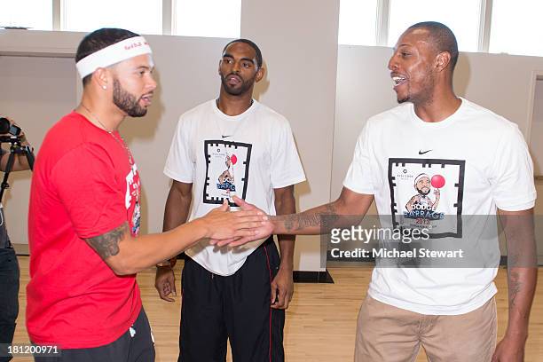 Brooklyn Nets players Deron Williams, Alan Anderson and Paul Pierce attend Dodge Barrage 2013 at Pier 36 on September 19, 2013 in New York City.