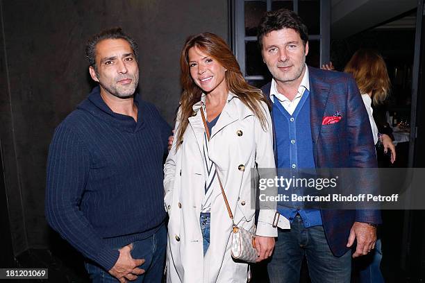 Jean-Pierre Martins, Alexandra Genoves and Philippe Lellouche attend 'A.Club Party' at Castel on September 19, 2013 in Paris, France.