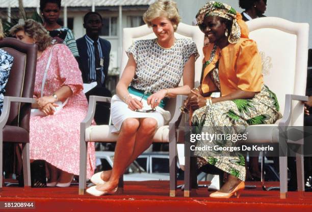 Diana, Princess of Wales, and Maryam Babangida, the wife of the former Nigerian president General Ibrahim Badamasi Babangida, attend the Rural...