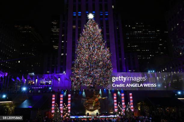 The Swarovski star is seen atop the Christmas Tree during the Rockefeller Center's annual lighting ceremony in New York, November 29, 2023.