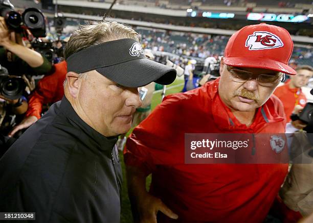 Head coach head coach Andy Reid of the Kansas City Chiefs greets head coach Chip Kelly of the Philadelphia Eagles after the game on September 19,...