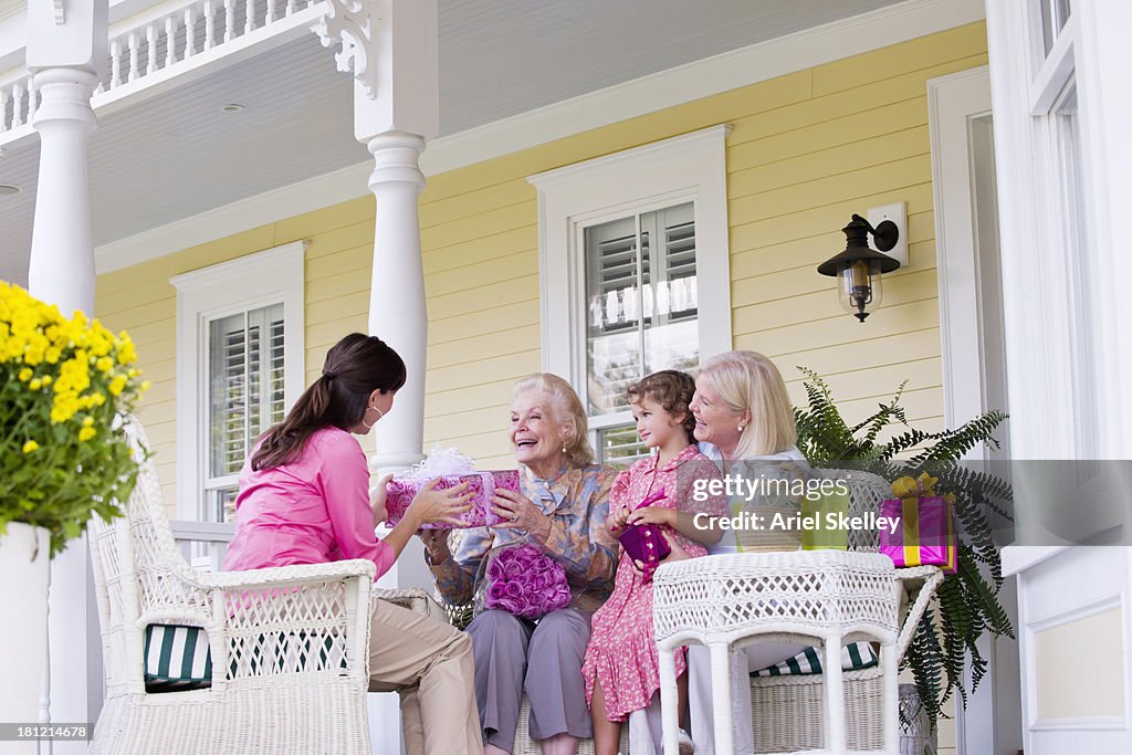 Four generations of Caucasian women at party