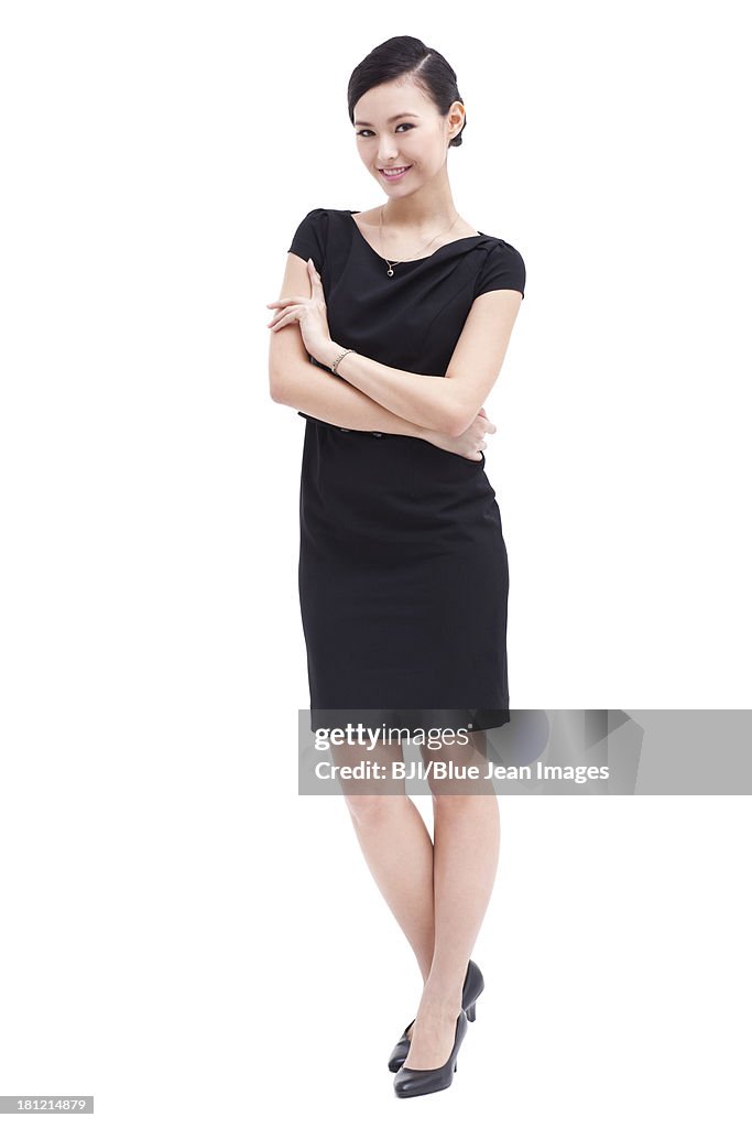 Fashionable businesswoman arms crossed