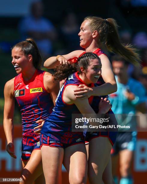 Alyssa Bannan of the Demons celebrates a goal with teammate Eden Zanker during the 2023 AFLW Round 07 match between the West Coast Eagles and Naarm...