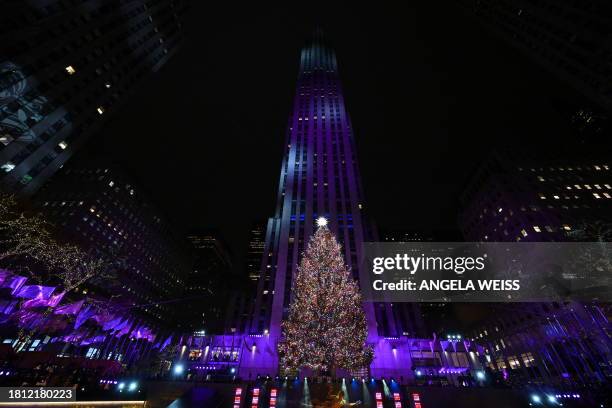 The Swarovski star is seen atop the Christmas Tree during the Rockefeller Center's annual lighting ceremony in New York, November 29, 2023.